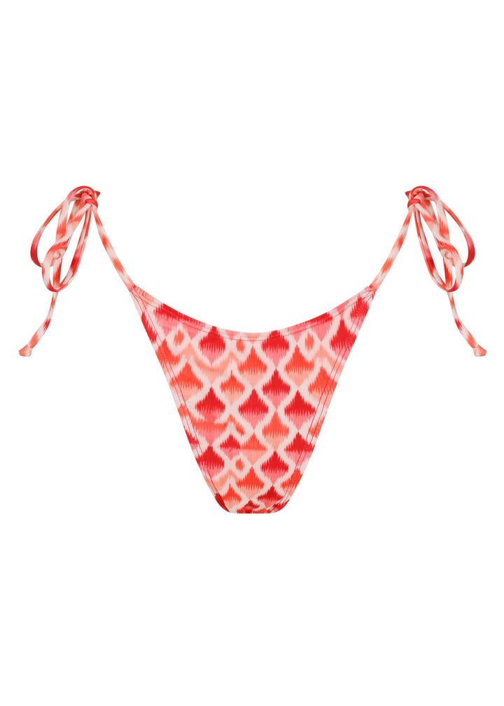 Juicy Classic Bottoms with red and white ikat-pattern bikini bottom with high-cut sides, adjustable hip ties, cheeky coverage on white backdrop.
