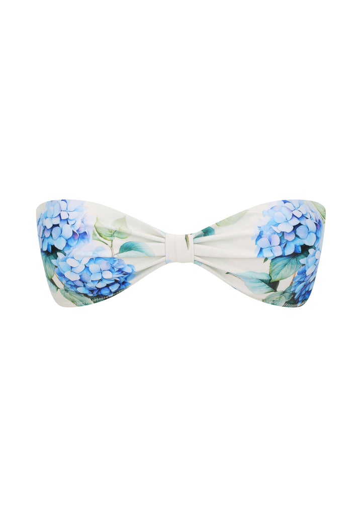 White Fleurs Duo Top in vibrant blue hydrangea floral print with green leaves, in bandeau top style and a gathered center, against a white backdrop.