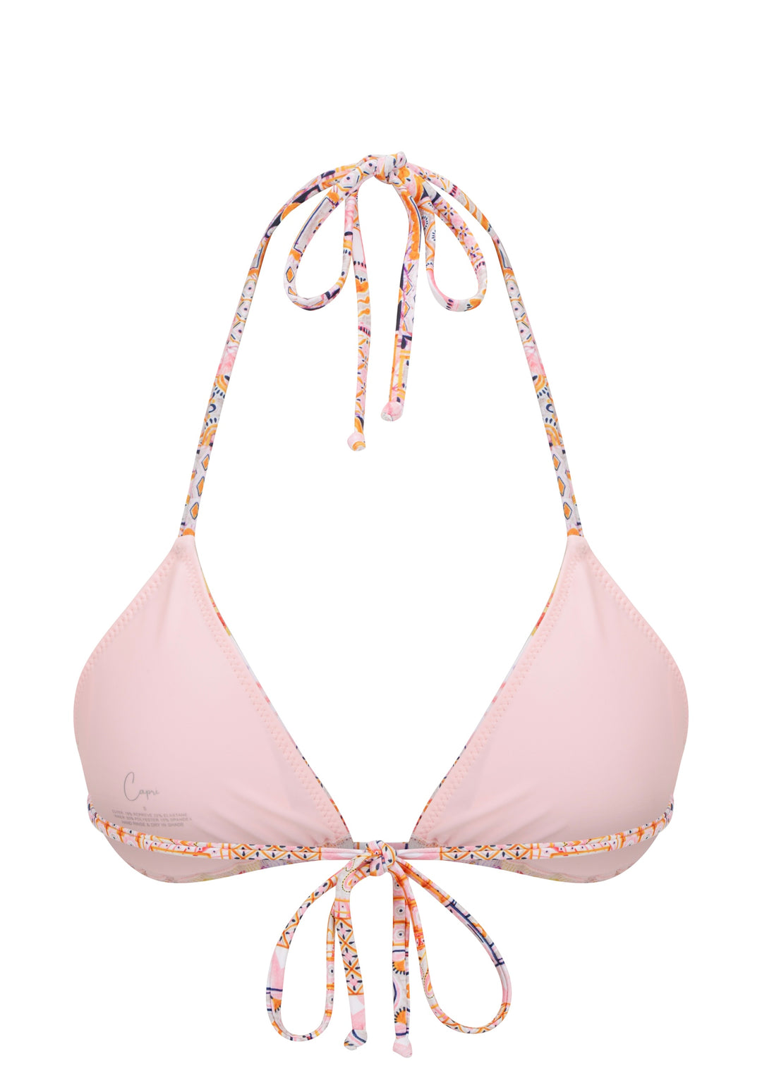 Calypso Top triangle halter inner view with light pink cloth cups, Capri Swim logo on left cup, adjustable neck and back ties, with a vibrant patchwork of floral and geometric patterns, including fruits, flowers, and tiles on a white backdrop.