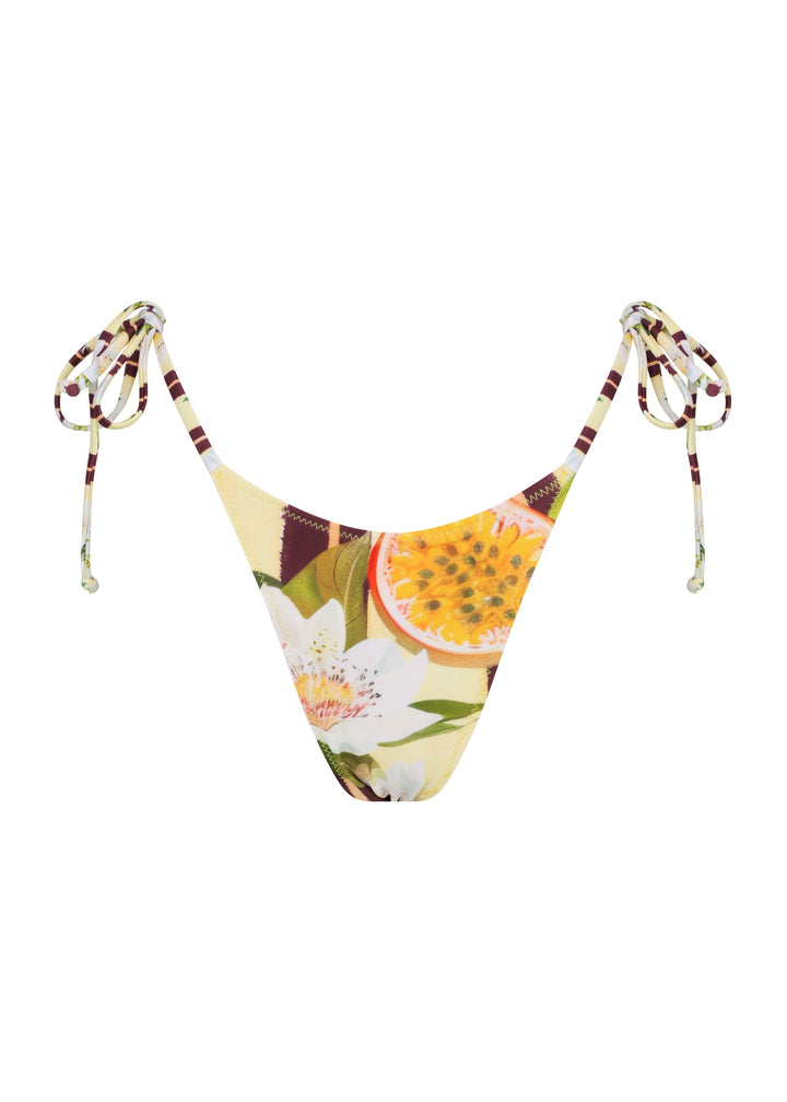 Front view of Passiontini Classic Bottoms classic triangle style with ties on the hips, in tropical passionfruit and floral print with yellow passionfruit halves, green leaves, and cream background. Cheeky coverage.
