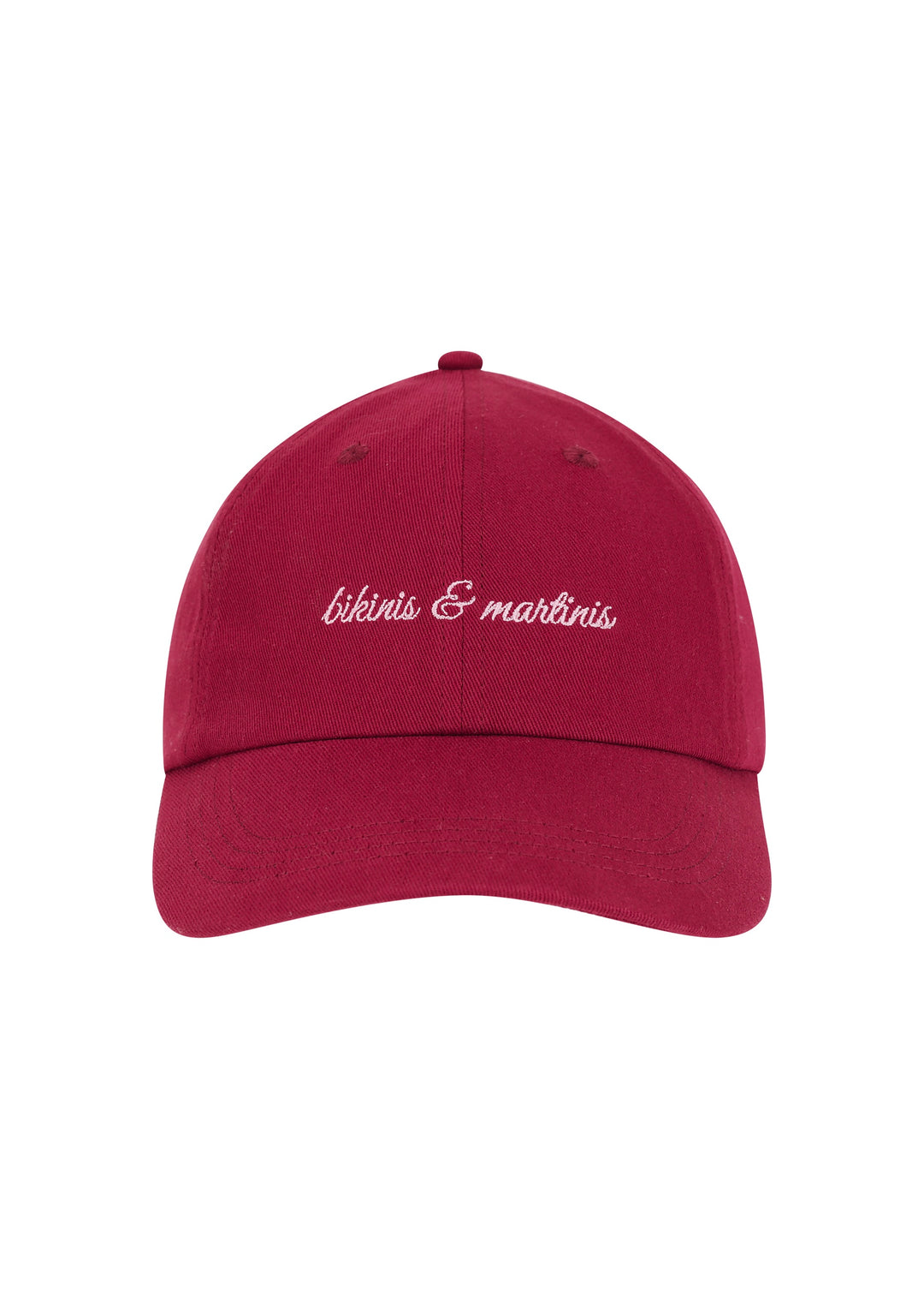 Burgundy colored Martini cap with the words "bikinis & martinis" in soft pink cursive on the front, made from 100% cotton twill, classic baseball cap design, against a white backdrop.
